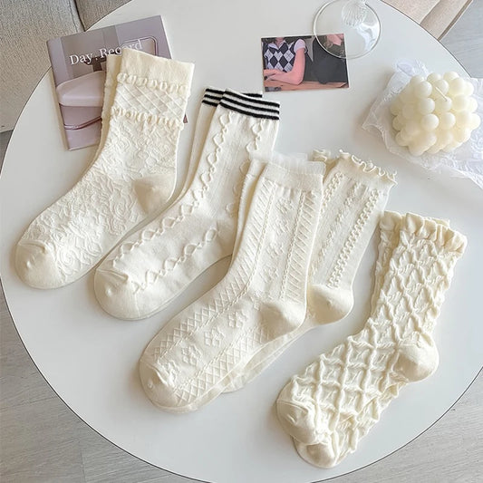 Women's cotton ankle socks with elegant ruffle and textured designs, ideal for spring and autumn