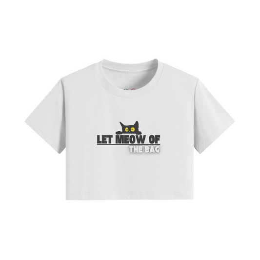 White crop t-shirt with "Let Meow of the Bag" cat graphic design.